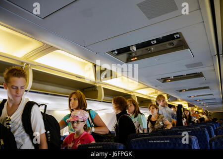 Illinois,IL,Upper Midwest,Prairie State,Land of Lincoln,Chicago,O'Hare International Airport,American Airlines,jet,flight,aisle,boarding,boy boys,male Stock Photo