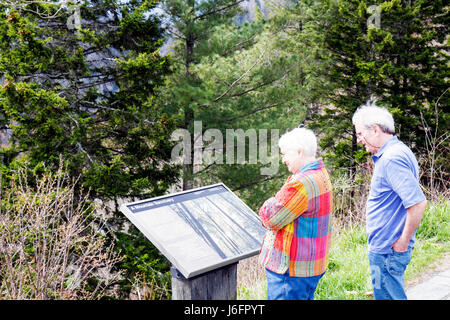 Tennessee Great Smoky Mountains National Park,Newfound Gap,senior seniors citizen citizens,couple,information,overlook,TN080501020 Stock Photo