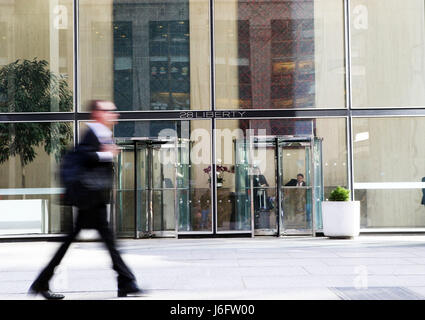 (170520) -- NEW YORK, May 20, 2017 (Xinhua) -- A man walks past 28 Liberty, a property purchased by Chinese investment company Fosun in downtown Manhattan, New York, the United States on May 15, 2017. 28 Liberty Street in the downtown Manhattan Financial District, formerly known as One Chase Manhattan Plaza, now houses U.S. headquarters of Fosun, a Chinese investment company. Fosun purchased the building from J.P.Morgan for $725 million U.S. dollars in 2013 and renamed it as 28 Liberty. Fosun has made a total of 3 billion dollars investment in the United States since 2012, supporting about 8,  Stock Photo