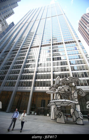 (170520) -- NEW YORK, May 20, 2017 (Xinhua) -- People walk past 28 Liberty, a property purchased by Chinese investment company Fosun in downtown Manhattan, New York, the United States on May 15, 2017. 28 Liberty Street in the downtown Manhattan Financial District, formerly known as One Chase Manhattan Plaza, now houses U.S. headquarters of Fosun, a Chinese investment company. Fosun purchased the building from J.P.Morgan for $725 million U.S. dollars in 2013 and renamed it as 28 Liberty. Fosun has made a total of 3 billion dollars investment in the United States since 2012, supporting about 8,  Stock Photo
