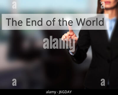 The End of the World - Businesswoman hand pressing button on touch screen interface. Business, technology, internet concept. Stock Photo Stock Photo