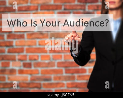 Who Is Your Audience? - Businesswoman hand pressing button on touch screen interface. Business, technology, internet concept. Stock Photo Stock Photo