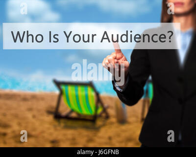 Who Is Your Audience? - Businesswoman hand pressing button on touch screen interface. Business, technology, internet concept. Stock Photo Stock Photo