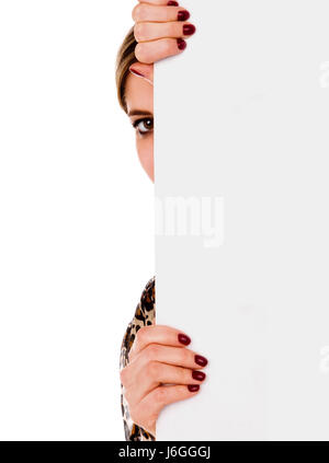 woman behind wall Stock Photo