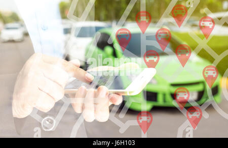 Car sharing service or rental concept. Sharing economy and collaborative consumption. Double exposure of business man holding mobile phone and use app Stock Photo