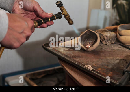 Silver Foundry by Artisan in her workshop Stock Photo