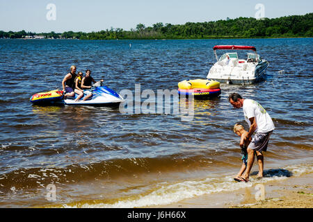 Kenosha Wisconsin,Silver Lake,Silver Lake Park,adult adults man men male,woman women female lady,boy boys,kid kids child children youngster youngsters Stock Photo