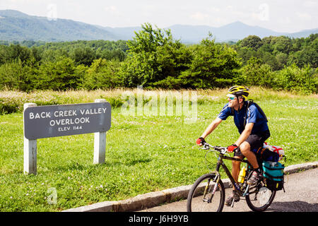 Blue Ridge Parkway Virginia,Appalachian Mountains,Roanoke Mountain,Virginia Explore Park,Back Creek Valley Overlook,man men male,bicycle,bicycling,rid Stock Photo