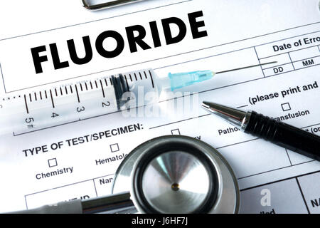 FLUORIDE Medicine doctor hand working Professional doctor use computer and medical equipment all around Stock Photo