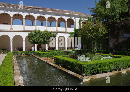 Granad, Spain - March 11, 2010: General view of The Generalife courtyard, with its famous fountain and garden. Alhambra de Granada complex, Spain Stock Photo
