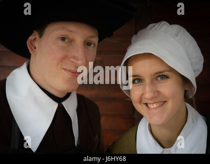 Two individuals in colonial historical costume Stock Photo