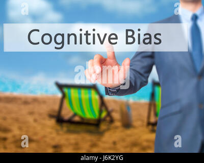 Cognitive Bias - Businessman click on virtual touchscreen. Business and IT concept. Stock Photo Stock Photo