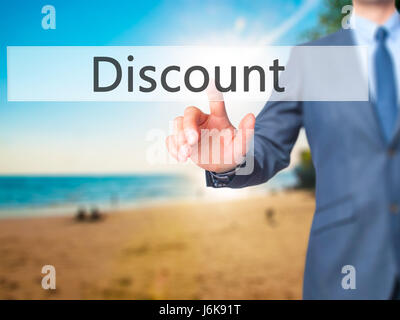 Discount - Businessman hand pushing button on touch screen. Business, technology, internet concept. Stock Image Stock Photo