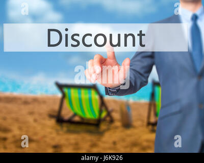 Discount - Businessman hand pushing button on touch screen. Business, technology, internet concept. Stock Image Stock Photo