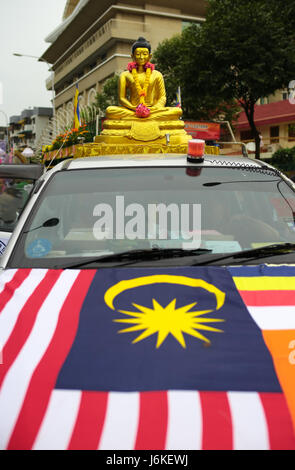 KL, MALAYSIA - 10 MAY 2017 : Buddha statue on top a pickup truck during Wesak day celebration at Brickfield Maha Vihara buddhish temple. Stock Photo