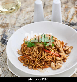 Thin noodles with chicken slices Stock Photo