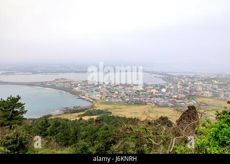 Apr 7, 2017 View of Seongsan Sunrise Peak in Jeju Island, South Korea Stock Photo