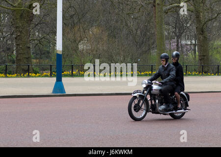 Actors filming the crown on a Triumph Tiger 100 Stock Photo