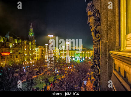 New Year's Eve 2000 celebration in the main square of Porto, Portugal, with fireworks and crowds of people. Stock Photo