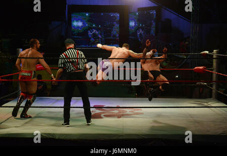 lnternational professional superstars wrestler in action during Pakistan’s first-ever international professional wrestling event Pro-Wrestling Entertainment (PWE)at Alhamra Punjabi complex in Lahore. (Photo by: Rana Sajid Hussain / Pacific Press) Stock Photo