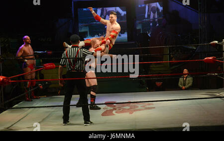 lnternational professional superstars wrestler in action during Pakistan’s first-ever international professional wrestling event Pro-Wrestling Entertainment (PWE)at Alhamra Punjabi complex in Lahore. (Photo by: Rana Sajid Hussain / Pacific Press) Stock Photo