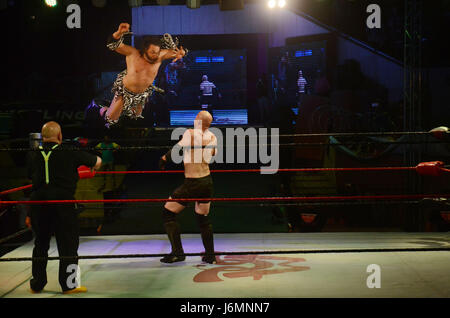 lnternational professional superstars wrestler in action during Pakistan’s first-ever international professional wrestling event Pro-Wrestling Entertainment (PWE)at Alhamra Punjabi complex in Lahore. (Photo by: Rana Sajid Hussain / Pacific Press) Stock Photo