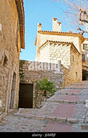 The gentle climb in old village of Eze, located on the hilltop and famous for the narrow stone streets and Jardin Exotic Botanical Garden, France. Stock Photo