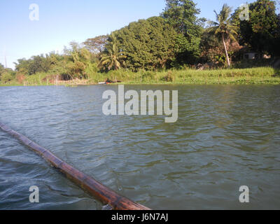 The image captures the riprap construction along the riverbanks of the ...