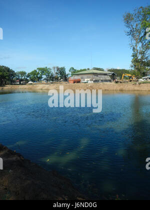 This image shows the fish ponds in the Malamig area of Bustos, Bulacan, Philippines. The ponds are part of the local aquaculture industry, which is important for the region's economy and food production. Stock Photo