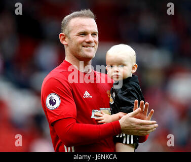 Manchester United's Wayne Rooney with son Kit after the final whistle in the Premier League match at Old Trafford, Manchester. Stock Photo