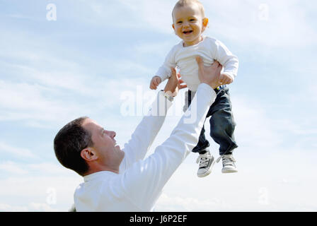 proud father -child uphold - Stock Photo