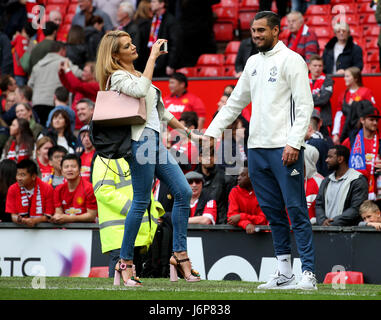 Manchester United's Sergio Romero (right) with wife Eliana Guercio (left) during the Premier League match at Old Trafford, Manchester. Stock Photo