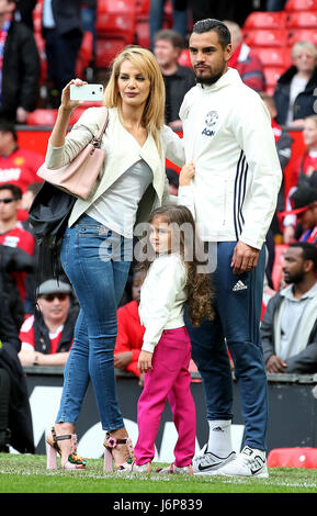 Manchester United's Sergio Romero (right) with wife Eliana Guercio (left) during the Premier League match at Old Trafford, Manchester. Stock Photo