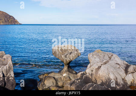 Kannesteinen is a special shaped stone located on the shore of Oppedal. Stock Photo