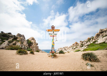A hand-made totem on the wild beach of (Valle della Luna) in Sardinia, Italy.