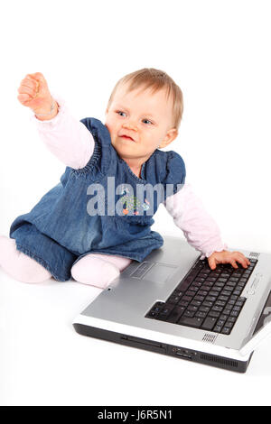 baby anger resentment annoy computer error child girl girls error earnest Stock Photo