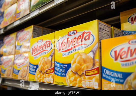 Boxes of Kraft Velveeta brand shells & cheese on the shelf of a grocery store Stock Photo