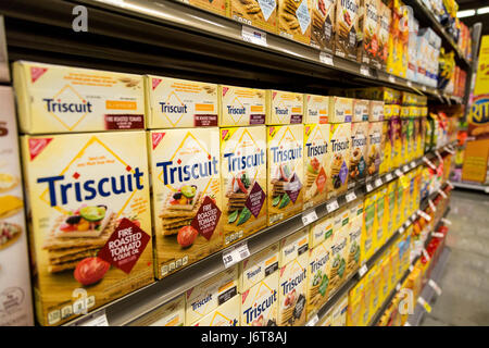 boxes of Triscuit brand crackers on the shelves of a grocery store Stock Photo