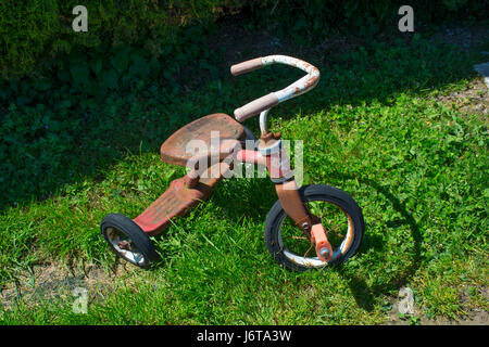 Old Rusty Tricycle Stock Photo