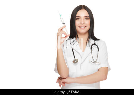 Beautiful nurse at hospital posing with injection in hand. Stock Photo