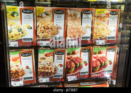 boxes of Stouffer's frozen dinners in the freezer case of a grocery store Stock Photo