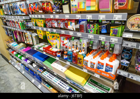 shelves of office supplies on display shelves at a retail store Stock Photo