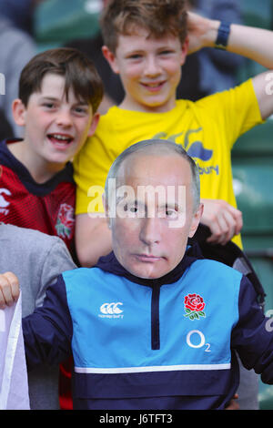 London, UK. 21st May, 2017. A slight bizarre mask being worn by a child at the finale of the HSBC World Rugby Sevens Series. The face is that of Vladimir Putin (the current President of the Russian Federation). Credit: Michael Preston/Alamy Live News Stock Photo