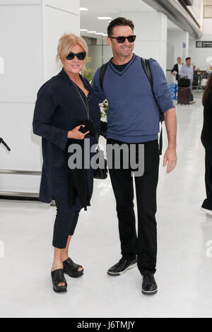 Chiba, Japan. 22nd May, 2017. Australian actor Hugh Jackman (R) and his wife Deborra-Lee Furness (L) arrive at Narita International Airport on May 22, 2017, Chiba, Japan. Jackman spent time to greet fans upon his arrival. He is here to attend the red carpet event and press conference for his movie ''Logan'' which hits theaters on June 1 in Japan. Credit: Rodrigo Reyes Marin/AFLO/Alamy Live News Stock Photo