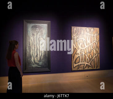 Mayfair,UK,22nd May 2017,A photo call of Pakistan Art took place at Bonhams in New Bond Street. These are two pieces by Sadequian, crucifix and four musicians. The auction takes place on the 24th May 2017©Keith Larby/Alamy Live News Stock Photo