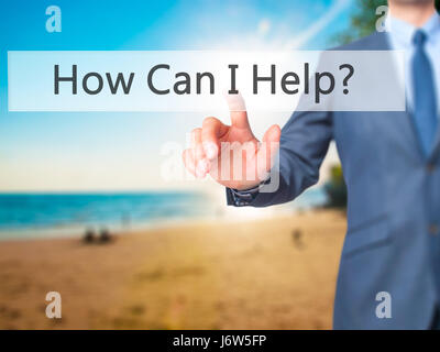 How Can I Help ? - Businessman hand pressing button on touch screen interface. Business, technology, internet concept. Stock Photo Stock Photo