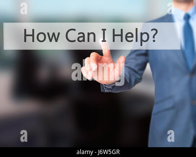 How Can I Help ? - Businessman hand pressing button on touch screen interface. Business, technology, internet concept. Stock Photo Stock Photo