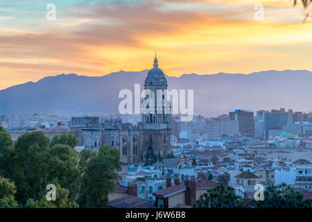 Malaga Cathedral with Old Town scenic view from Gibralfaro at sunset at twilight at dusk in the evening Stock Photo