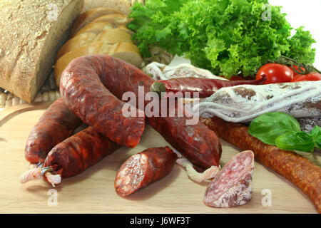 spain fan parsley salami hard cured sausage sausage snack time dainty food dish Stock Photo
