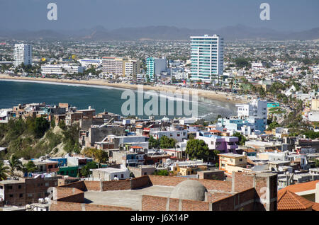 View of the Malecon (Paseo Claussen) in Mazatlan, Sinaloa, Mexico showing hotels and condominiums along the coastline of the Pacific ocean. Stock Photo